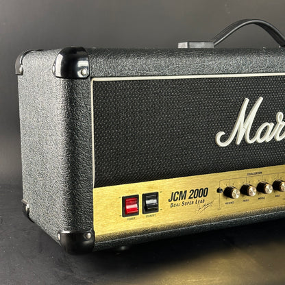 Marshall amplifier head with 'JCM 2000' and 'Dual Super Lead' on a dark background