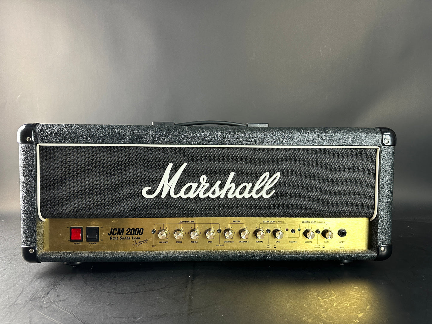 Marshall guitar amplifier head on a gray background