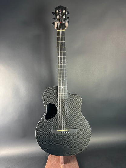 Acoustic guitar on a gray background
