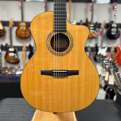 Front of body of Used 2011 Taylor NS24ce-G Nylon Natural w/bag TSS6241