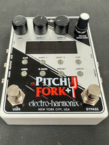 Electro-Harmonix Pitch Fork+ guitar effects pedal on a gray background