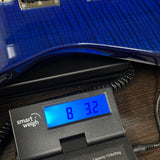 Used Jackson SL2H Trans Blue on scale displaying weight.