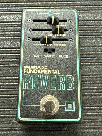 Walrus Audio Fundamental Reverb guitar effects pedal on a textured surface