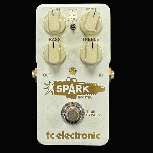 Guitar effects pedal with 'Spark' branding on a metallic background