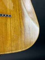 Wooden surface with screws on a dark background