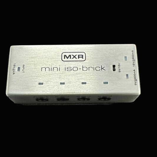 MXR mini iso-brick power supply on a textured surface