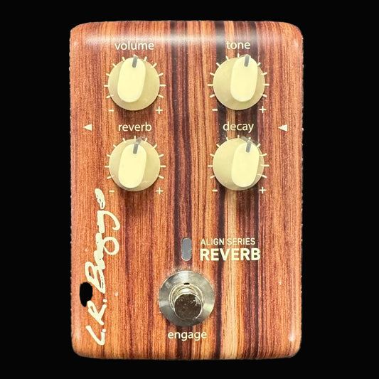 Wooden guitar effects pedal with knobs and labels on a textured background