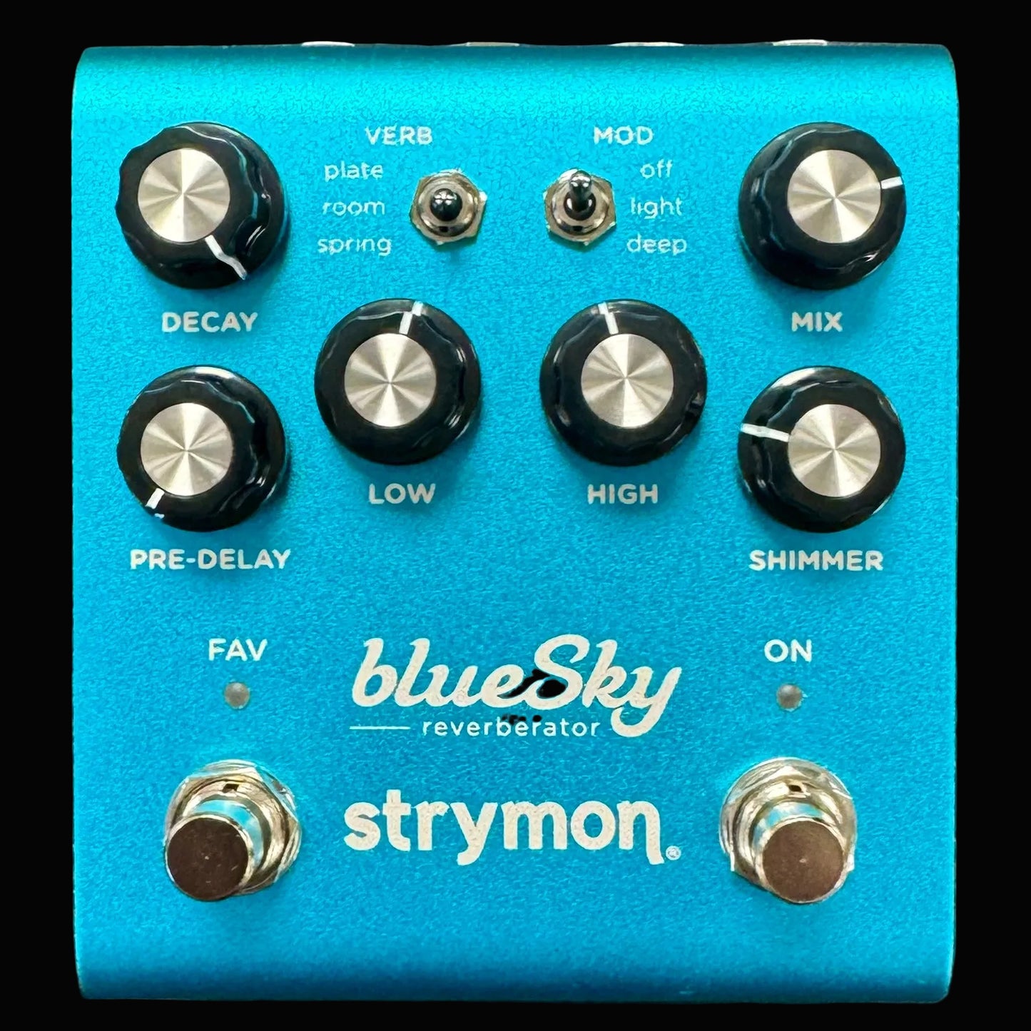 Blue Sky reverberator guitar effects pedal by Strymon on a textured surface