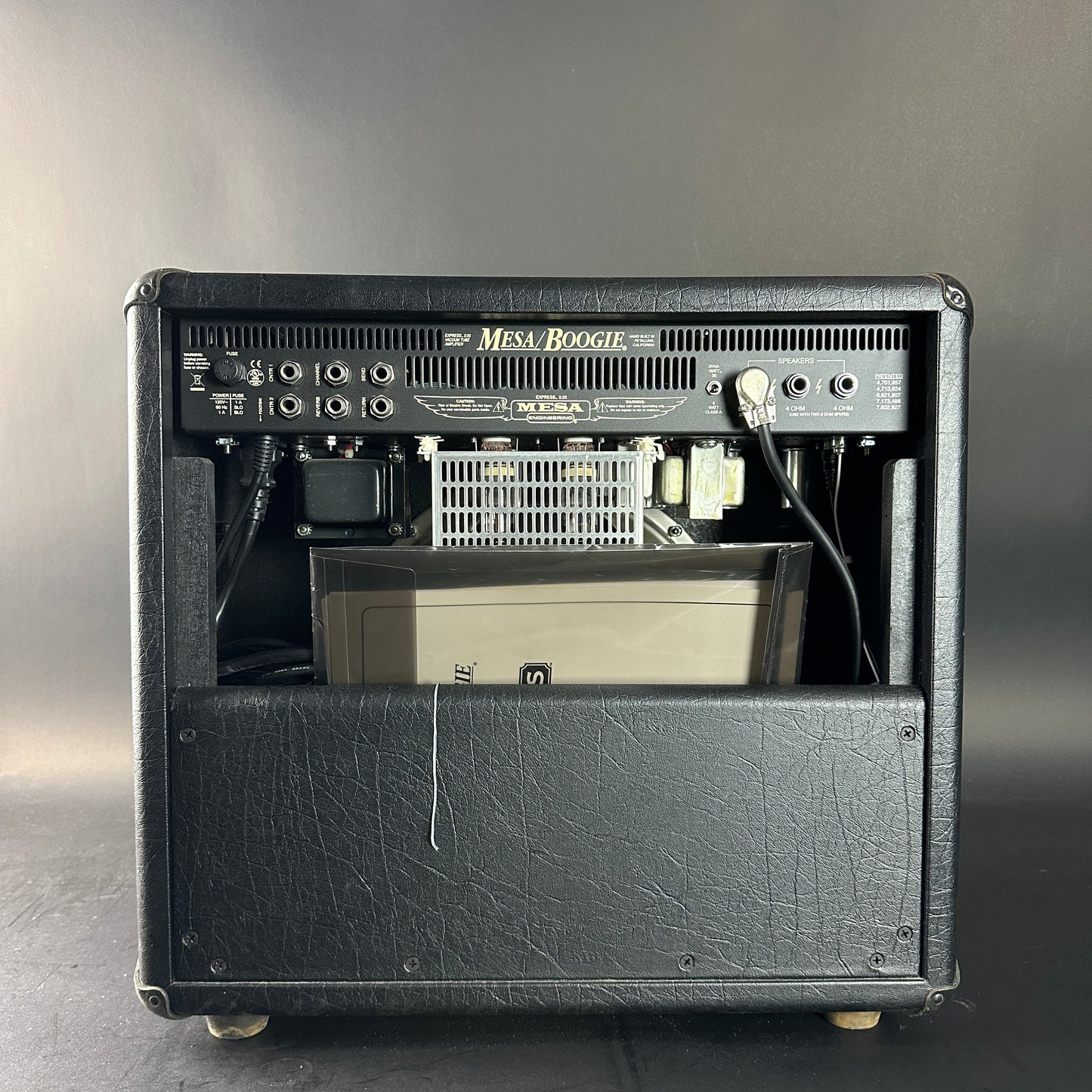 Guitar amplifier with visible brand name on a gray background