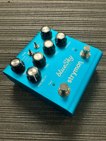 Blue guitar effects pedal with 'Strymon' branding on a textured surface