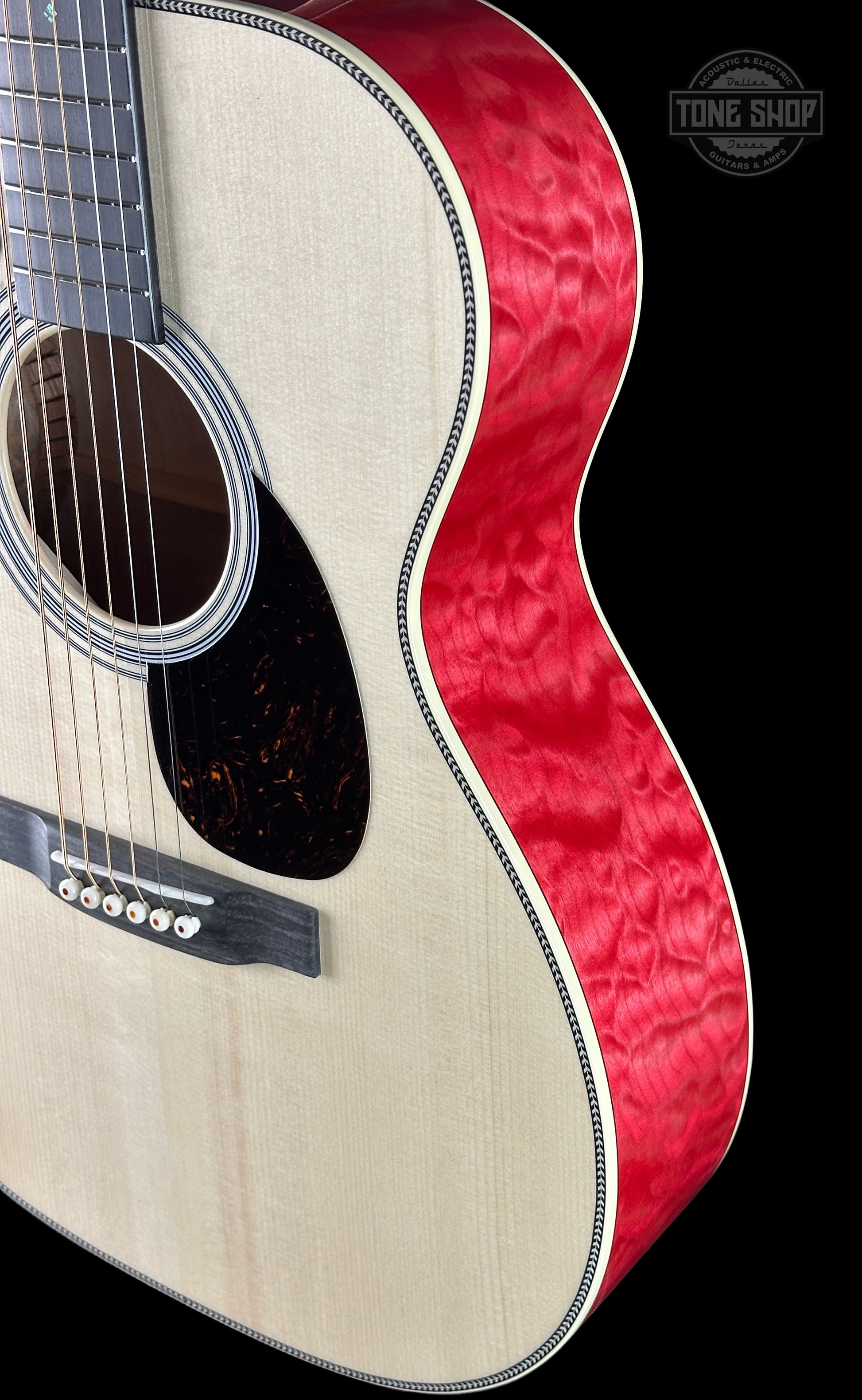 Side of Martin Custom Shop 000 14-Fret Quilted Maple.