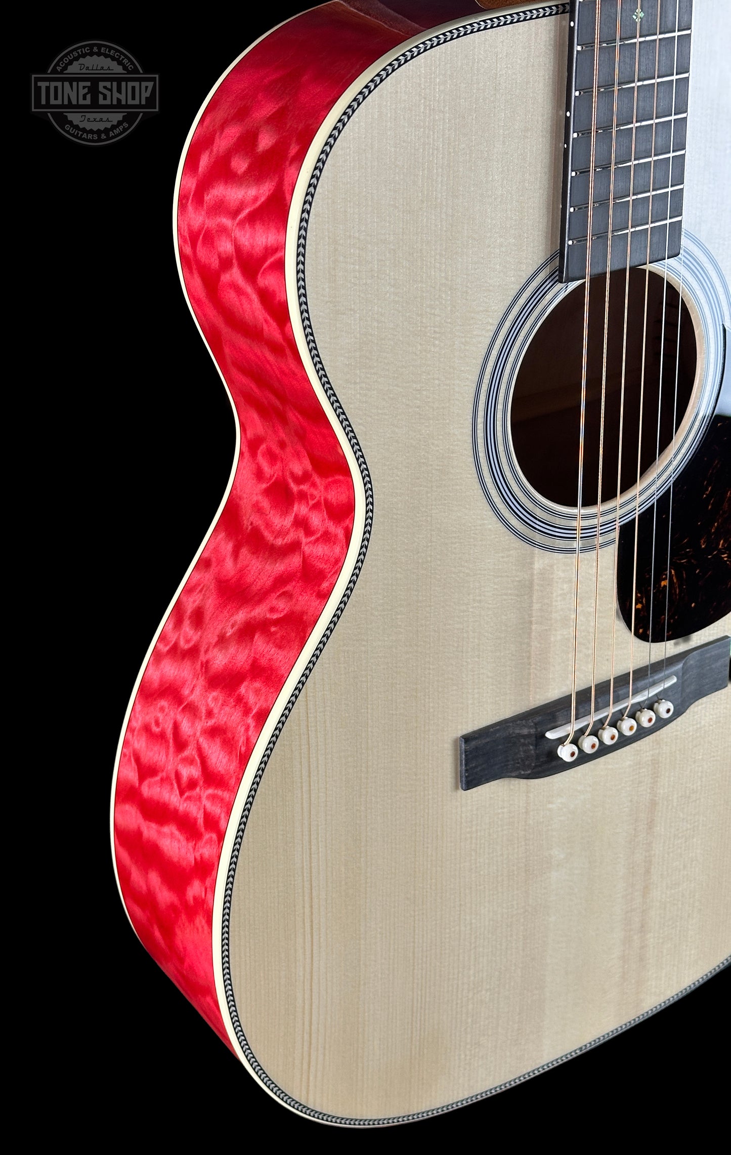 Side of Martin Custom Shop 000 14-Fret Quilted Maple.