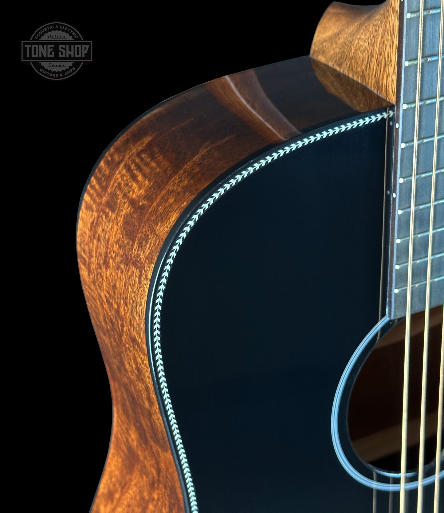 Shoulder of Martin Custom Shop Dread 14-Fret Jaguar Claw Mahogany Black Top.