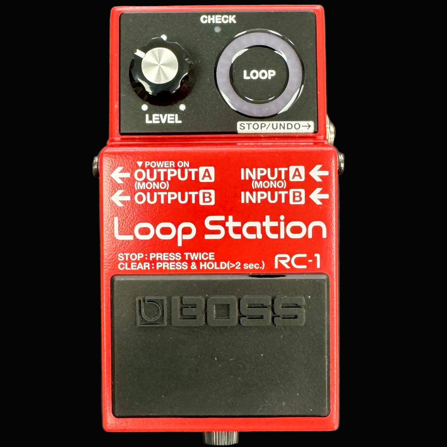 Red Boss Loop Station RC-1 pedal on a gray background