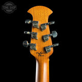 Close-up of the headstock of a guitar, showing six black tuning pegs with silver rings and the script logo 'Crafted in China' on a black background.