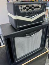 Jackson guitar amplifier head and cabinet on a stand