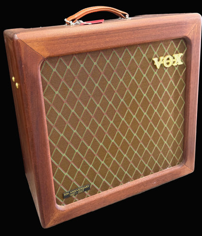 Wooden VOX amplifier with diamond pattern on the front panel