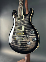Front angle of Used 2024 PRS McCarty 594 10 Top Charcoal Burst.