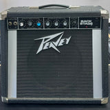 Peavey guitar amplifier with control panel and logo on a dark background