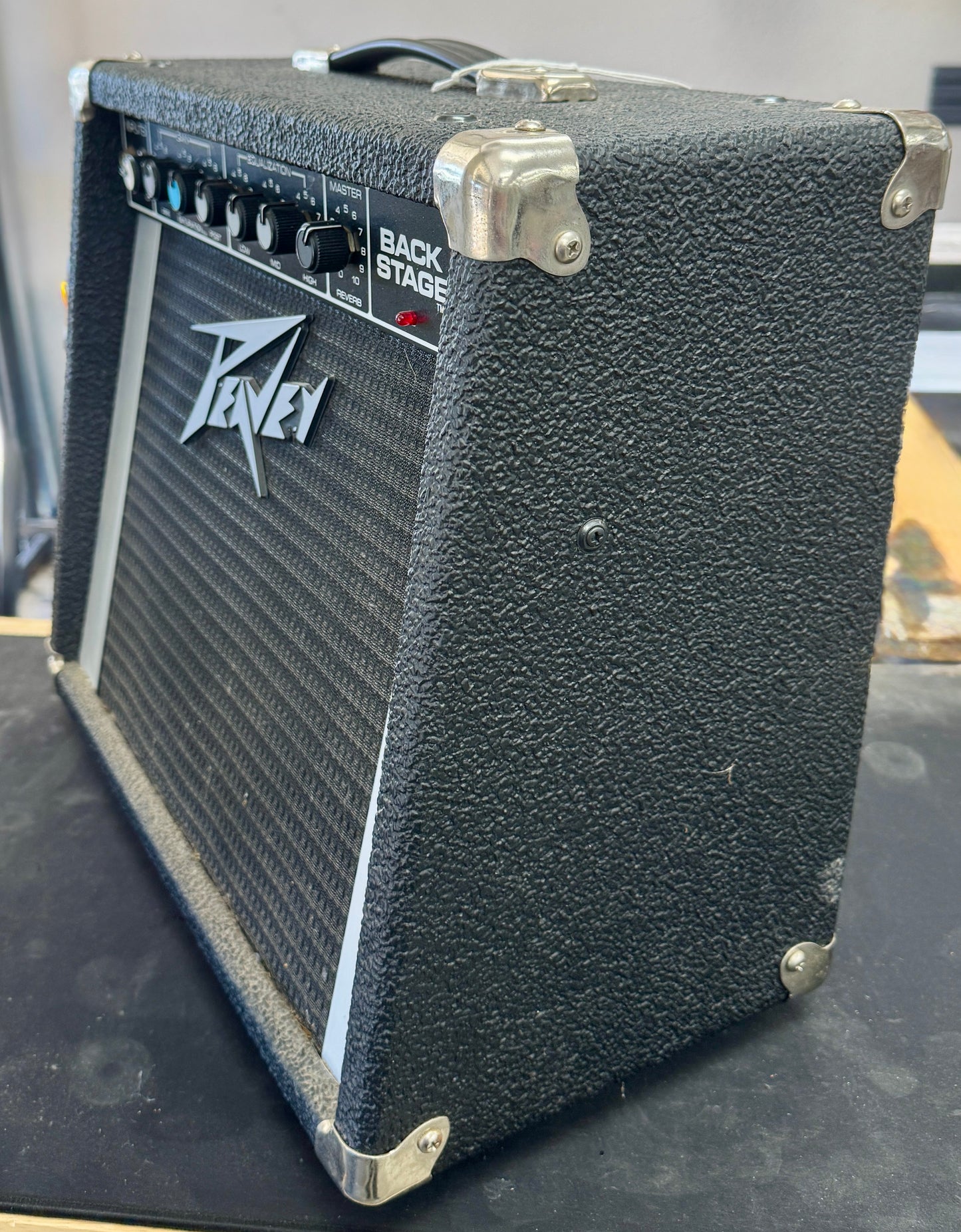 Peavey guitar amplifier on a dark surface