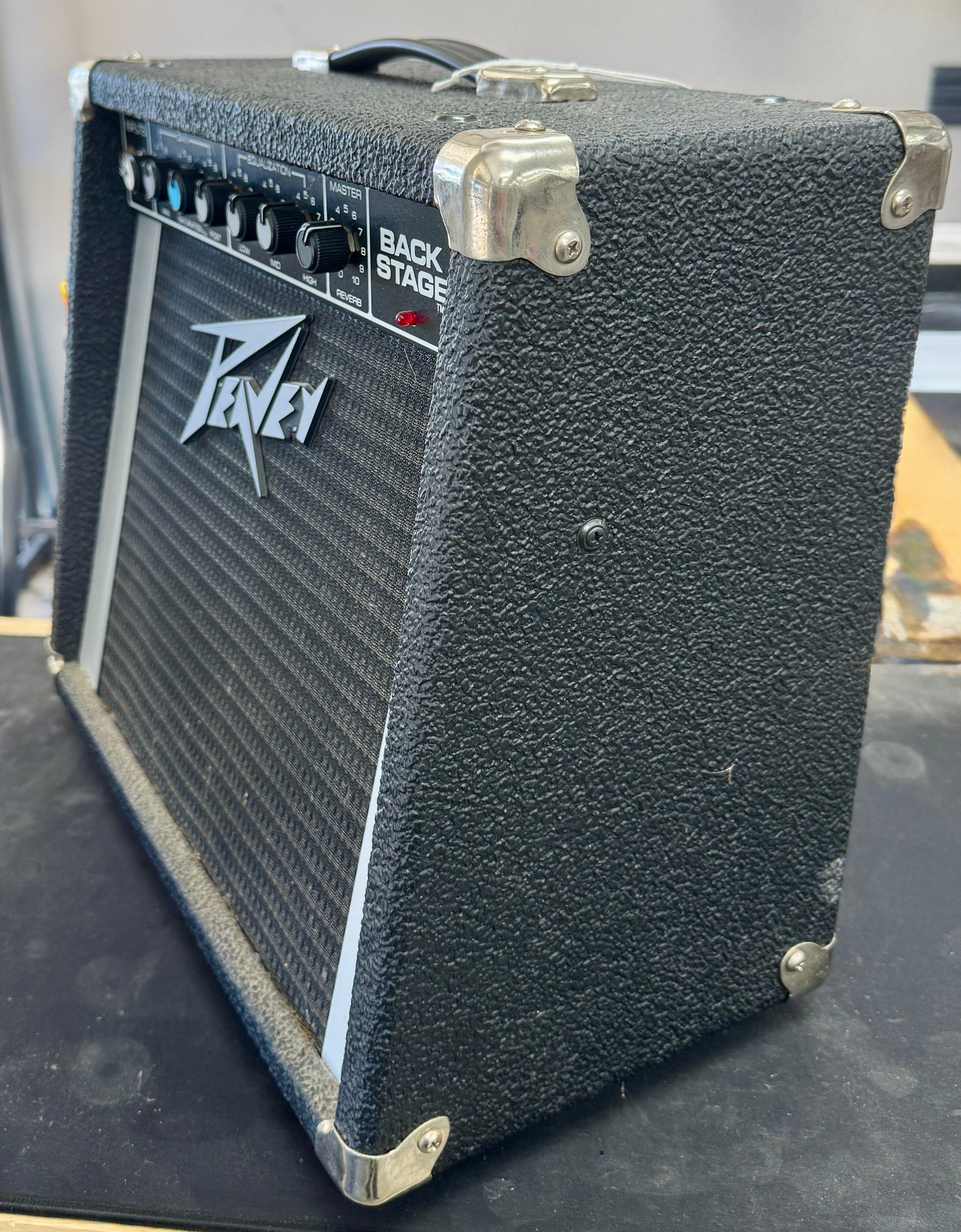 Peavey guitar amplifier on a dark surface