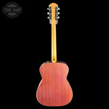 The back view of an acoustic guitar with a reddish-brown wooden body and a light natural wood neck, shown against a solid black background. A 'TONE SHOP' watermark is visible in the top-left corner.