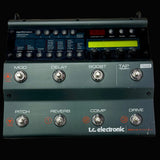 T.C. Electronic guitar effects pedal on a wooden surface