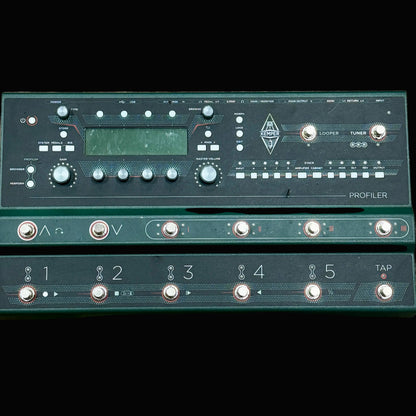 Electronics device with buttons and display on a wooden surface