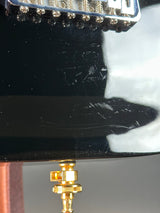 Wear on body of Used Schecter Omen-8 Left Handed Black.