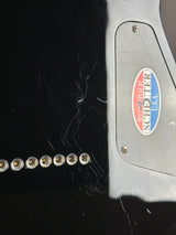Wear on back of Used Schecter Omen-8 Left Handed Black.