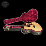 Taylor 314ce Prototype Next Generation  Acoustic guitar in a red-lined case with 'Tone Shop' logo in the corner.