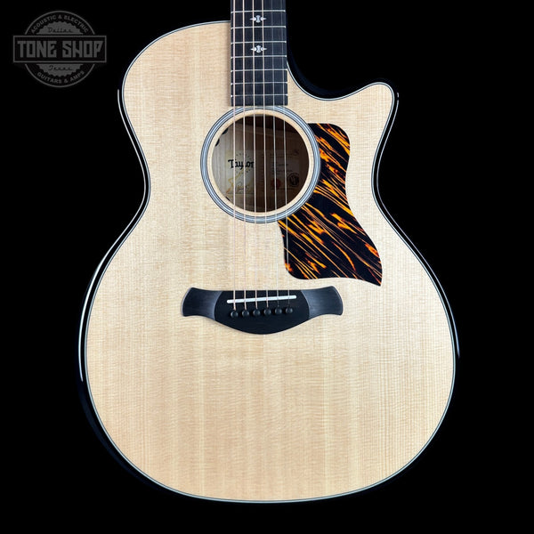 Taylor Builder's Edition 514ce Prototype Acoustic guitar with a flame maple top on a black background, featuring the Tone Shop logo.