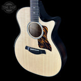Taylor Builder's Edition 514ce Prototype Acoustic guitar with a flame maple top on a black background, featuring the Tone Shop logo.