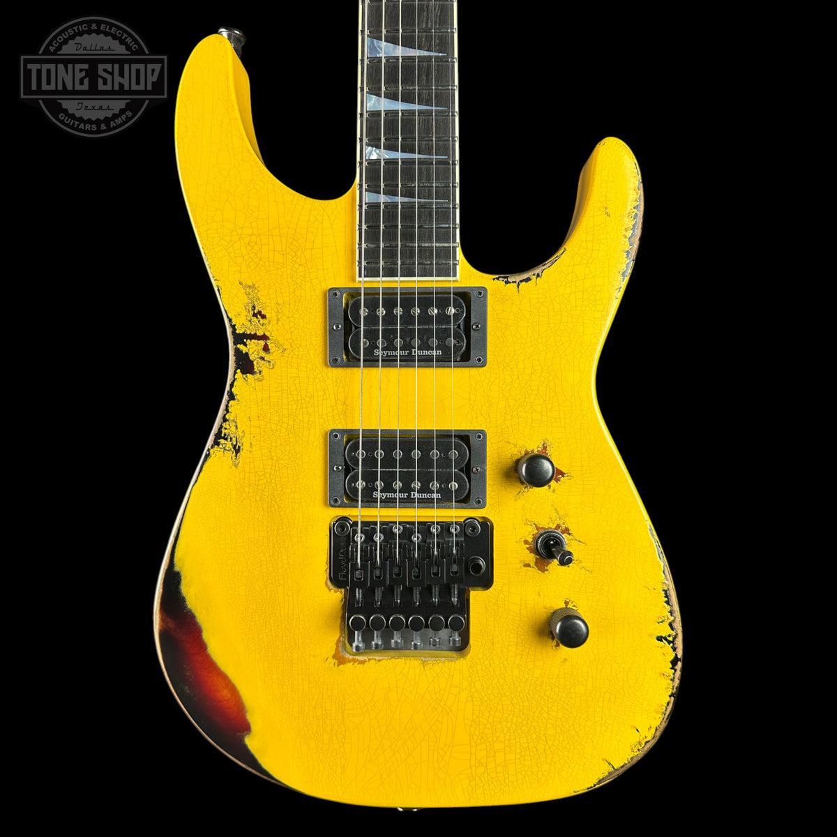 Front of Jackson Custom Shop USA Special Edition Soloist Taxi Cab Yellow Nitro Tour Relic.