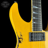 Front detail of Jackson Custom Shop USA Special Edition Soloist Taxi Cab Yellow Nitro Tour Relic.
