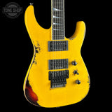 Front angle of Jackson Custom Shop USA Special Edition Soloist Taxi Cab Yellow Nitro Tour Relic.