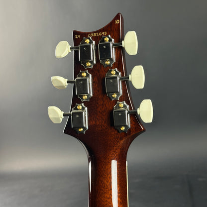 Back of headstock of Used PRS McCarty 594 Singlecut 10-Top Tobacco Sunburst.