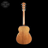 Back view of Taylor Gold Label 514e Prototype Sunburst acoustic guitar on a black background with 'Tone Shop' logo.