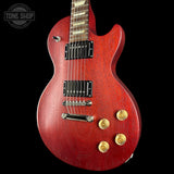 Front angle of Used 2009 Gibson Les Paul Studio Faded Cherry Red.