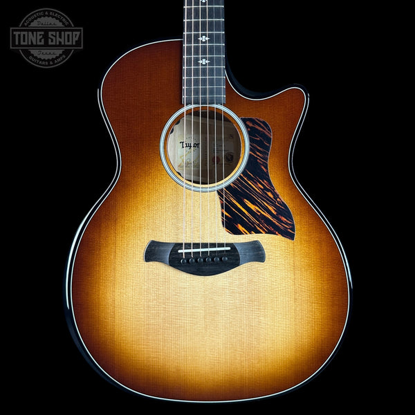 Taylor Builder's Edition 514ce Prototype Acoustic guitar with a sunburst finish on a black background, featuring the Tone Shop logo.
