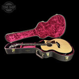 Taylor Builder's Edition 514ce Prototype inside a brown case with red lining on a black background