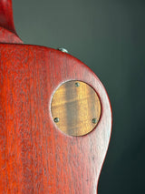 Wood panel on back of Used 2009 Gibson Les Paul Studio Faded Cherry Red.