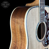 Shoulder of Gibson Hummingbird Custom Koa Antique Natural.