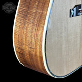 Front detail of Gibson Hummingbird Custom Koa Antique Natural.