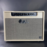 Guitar amplifier with brand logo on a gray background