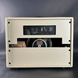 Guitar amplifier with Celestion speaker on a gray background