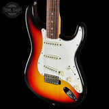 Electric guitar with sunburst finish on a black background, featuring the Tone Shop logo.