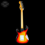 Electric guitar with a sunburst finish on a black background, featuring the Tone Shop logo.