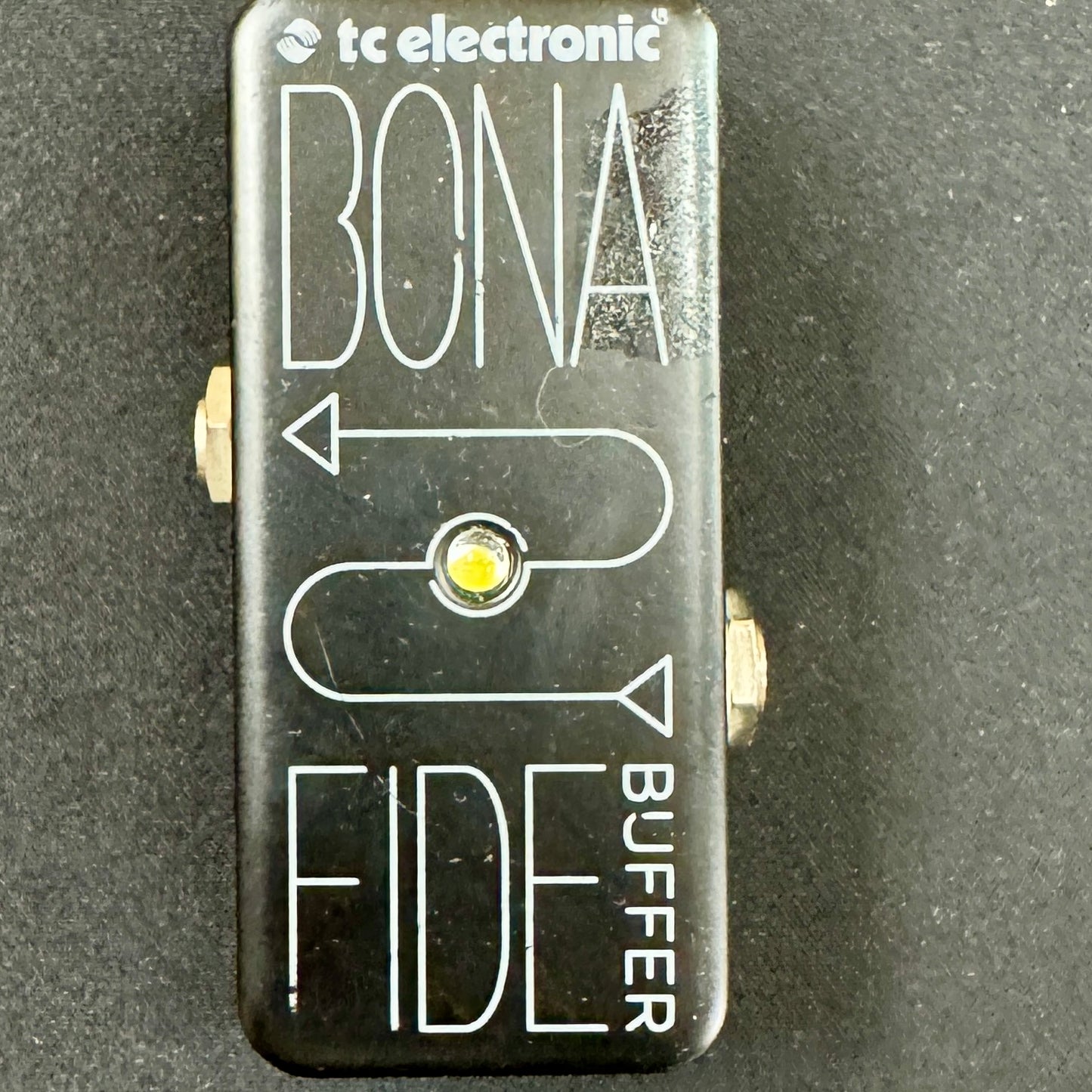 Guitar effects pedal with 'Bona Fide Buffer' branding on a dark background