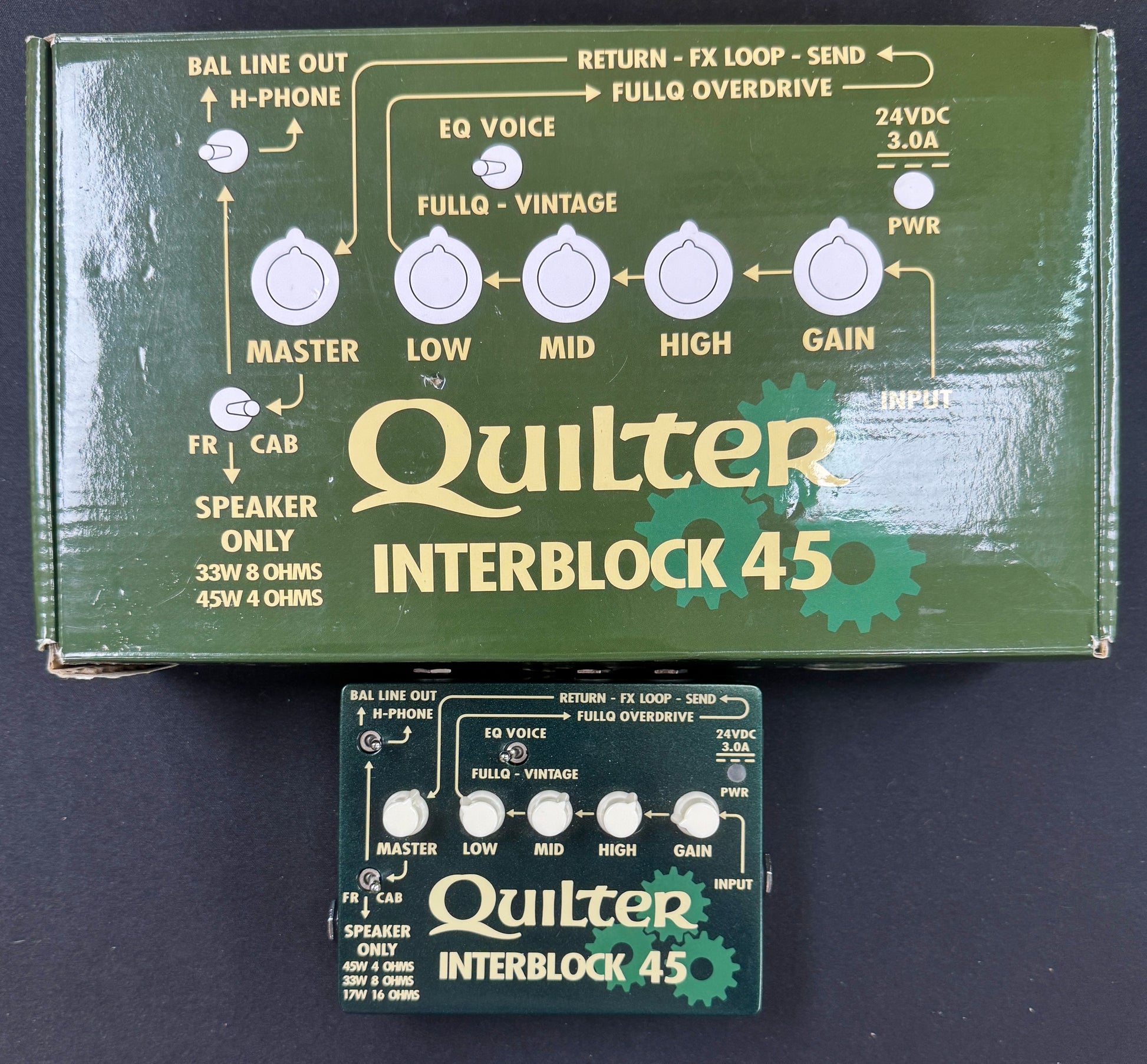 Quilter Interblock 45 guitar effects pedal packaging on a dark background